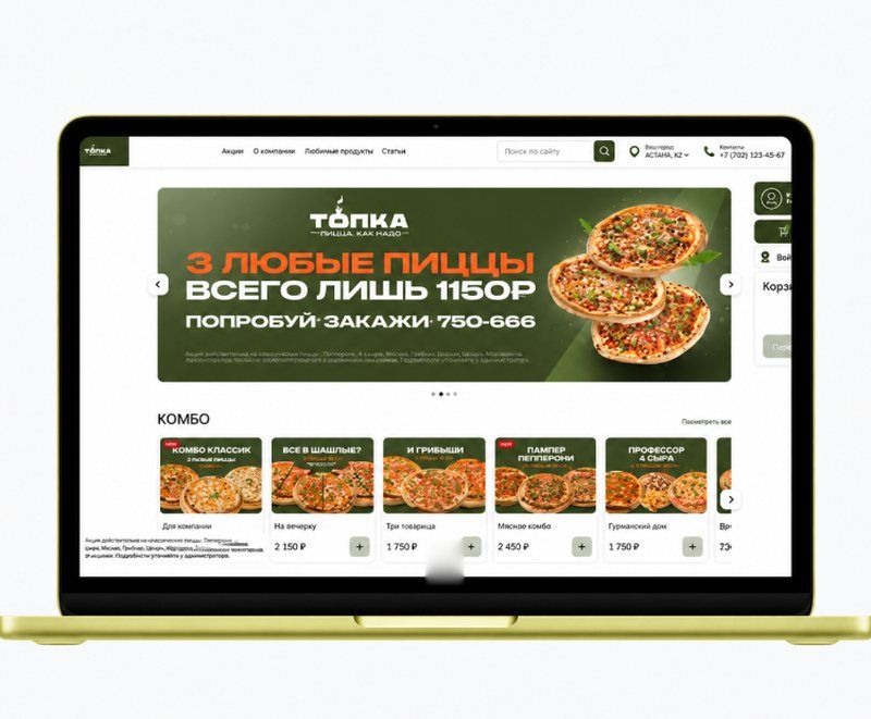 Topka pizzeria website on a laptop